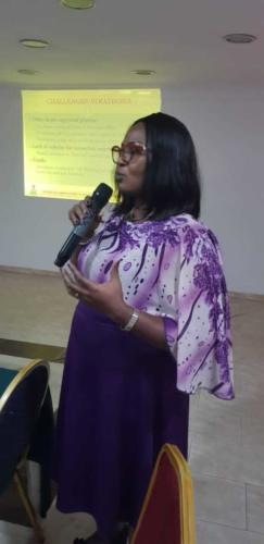 Dr. Lawrena Okoro (Deputy Registrar, Mentorship, Inspection & Molecular Laboratories) presenting at the Retreat